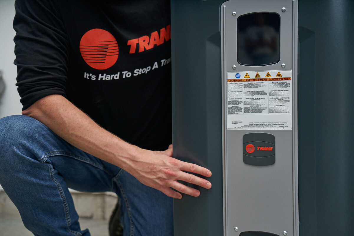 Trane employee working on indoor comfort equipment